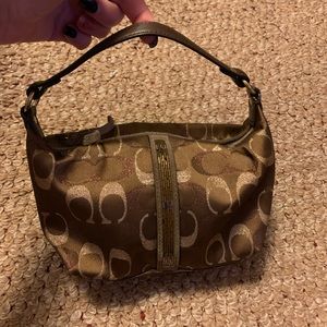Small coach handbag with strip of sequins